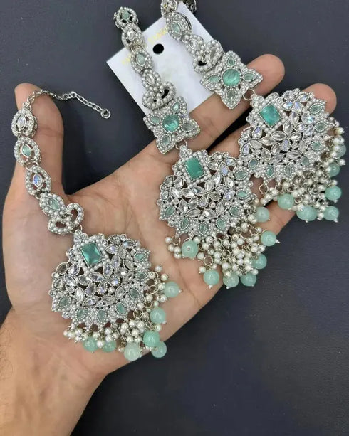 Clock earrings Tika